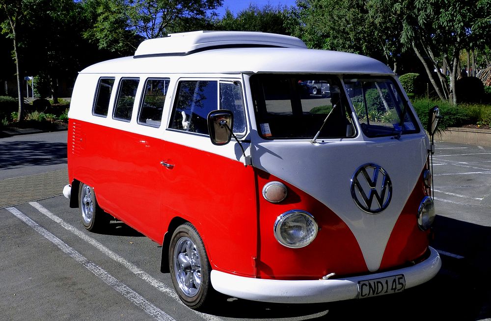1966 Volkswagon Kombi parked outside. The Volkswagen Type 2, known officially (depending on body type) as the Transporter…