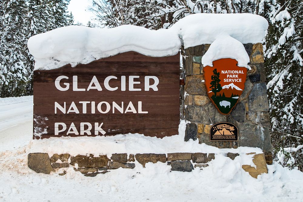 Glacier Entrance Sign in Snow. Original public domain image from Flickr