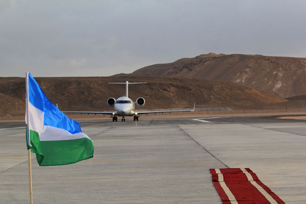 A plane taxis towards the terminal building on its inaugural flight to the newly opened Bossaso International Airport in…