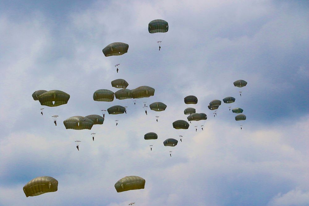 U.S. and British Paratroopers assigned to the 3rd Brigade Combat Team, 82nd Airborne Division and 16th Air Assault Brigade;…