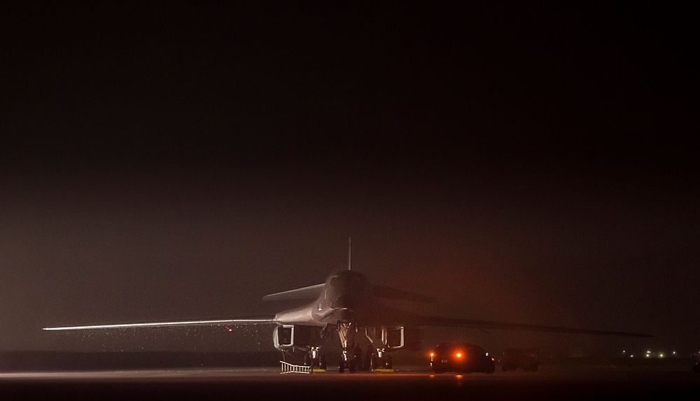 U.S. Air Force personnel prepare a B-1B Lancer aircraft with the 337th Test and Evaluation Squadron for an early morning…