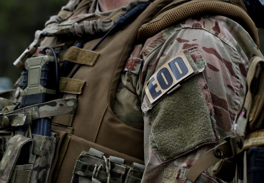 A U.S. Air Force Explosive Ordinance Disposal Technician from the New Jersey Air National Guard awaits the start of a joint…