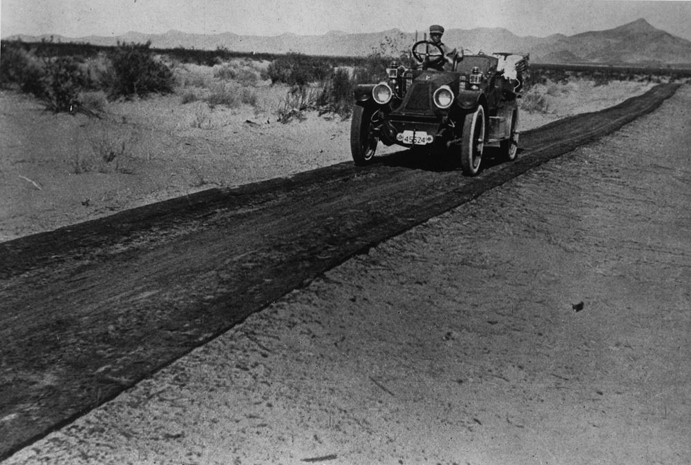 Historical image of vehicle traveling on Plank Road. Original public domain image from Flickr
