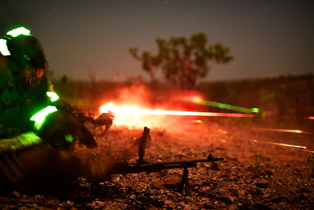 Australian Defence Force members with Charlie Company, 5th Royal Australian Regiment, fire squad automatic weapons during…