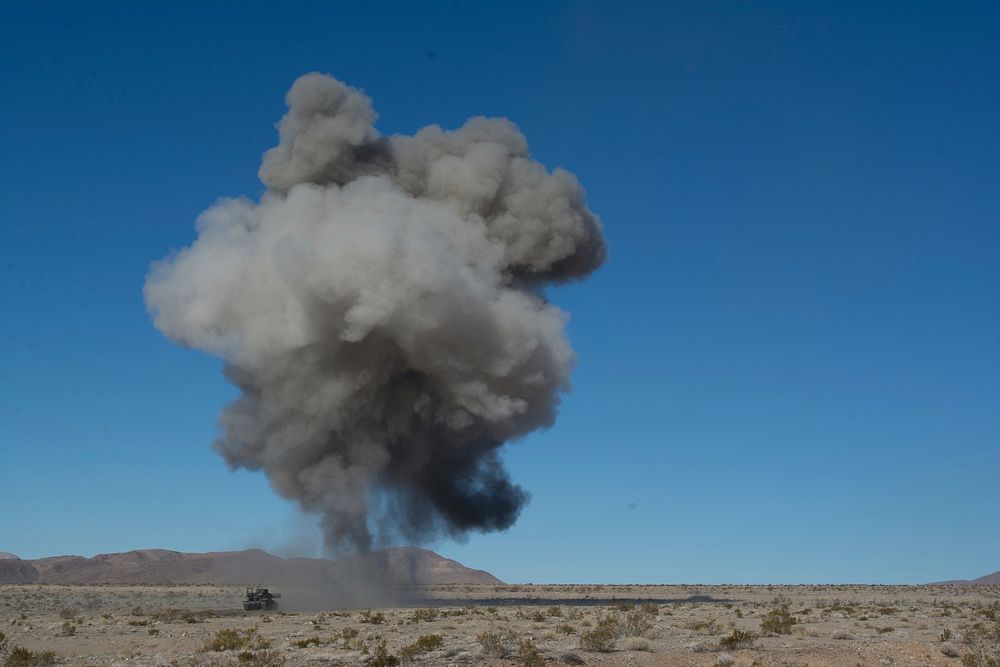 An Armored Vehicle-Launched MICLIC (AVLM) from the 391st Mobile Augmentation Company (MAC) detonates its line charge after…