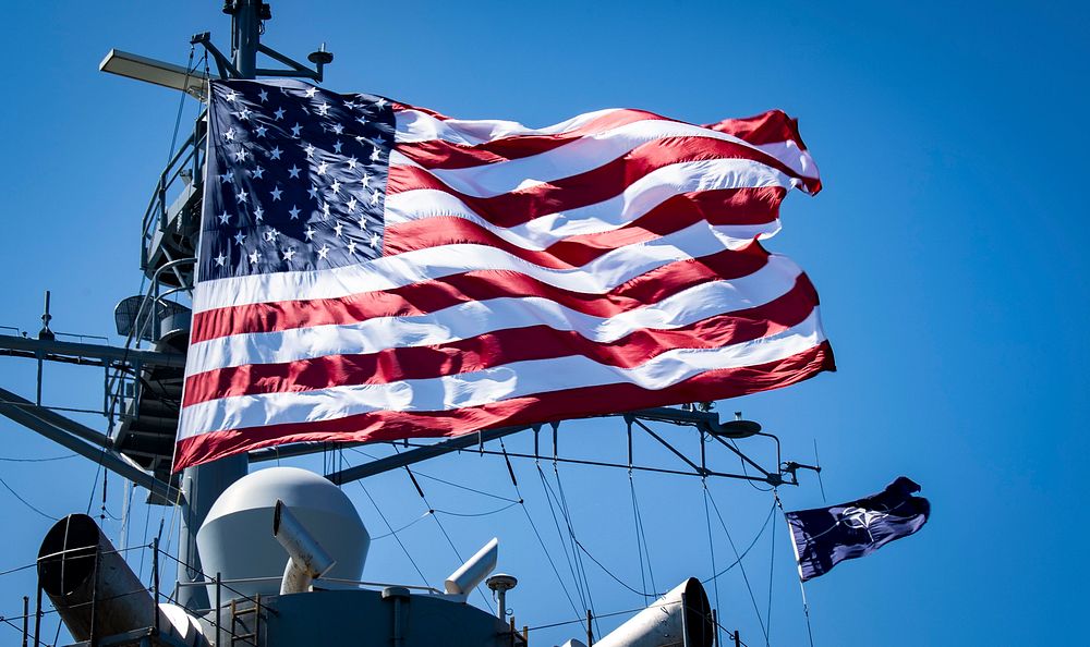 BALTIC SEA (June 8, 2020) The American Flag flies next to the NATO flag on the mast of the Blue Ridge-class command and…
