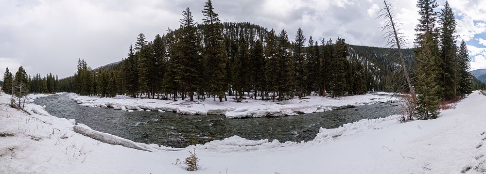 Snowbanks melting on the Gallatin River. March, 2020. Gallatin River, Bozeman, Gallatin County, Montana.. Original public…