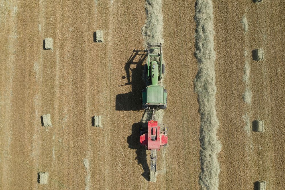 Hay harvest at Ernie Schirmer Farms in Macdona, TX, just outside of San Antonio, TX. USDA Photo by Lance Cheung. Original…