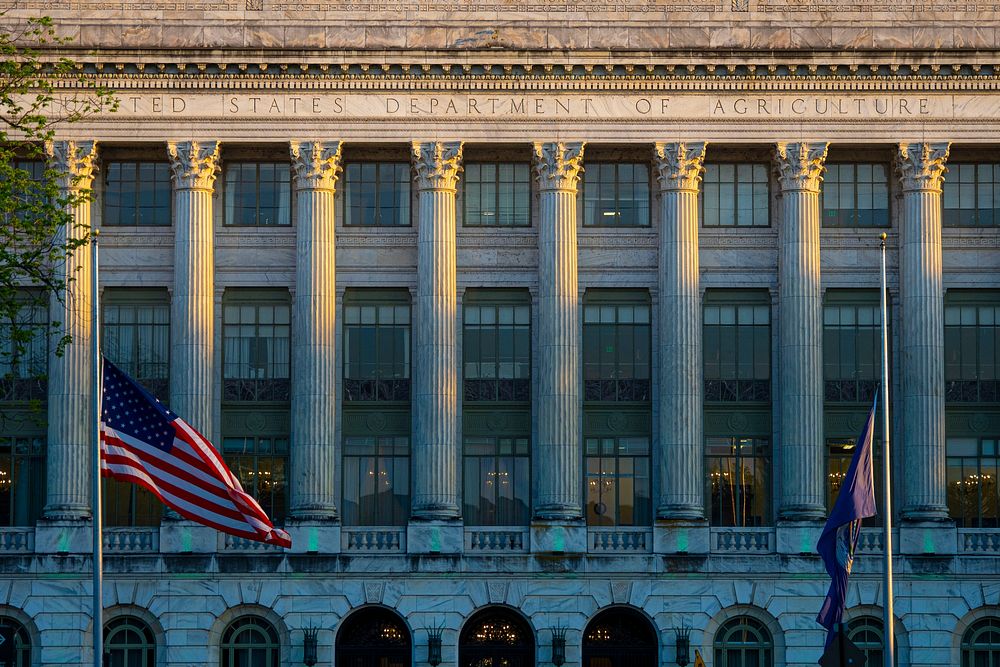 Green lights illuminate the USDA’s Jamie L. Whitten Building in Washington, DC, April 19, 2021 and will remain lit until…