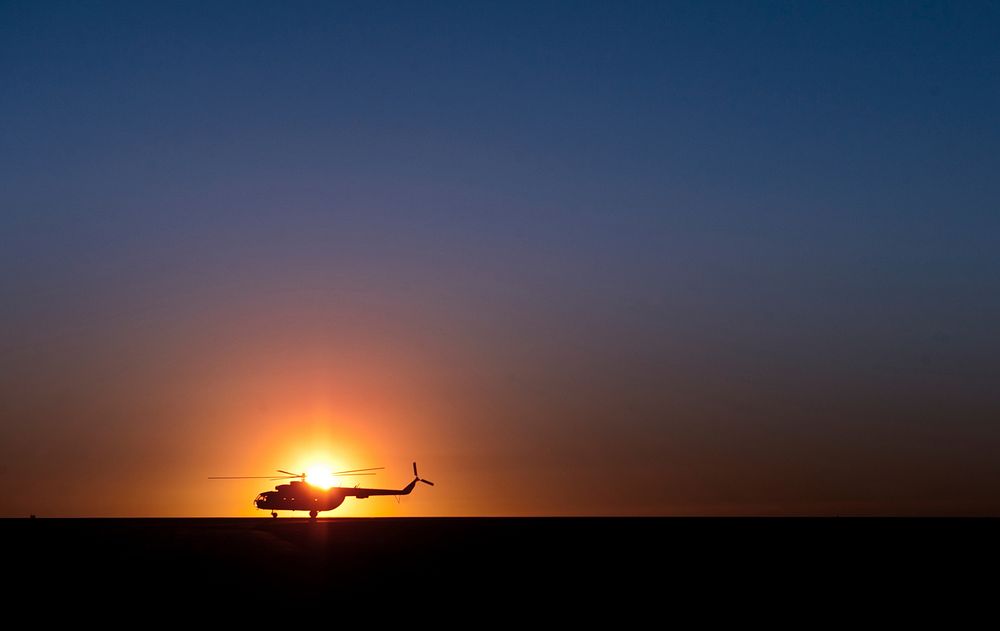 A Sikorsky S-61L Mk II helicopter taxis on the runway at sunrise at Camp Leatherneck, Helmand province, Oct. 23. The S-61L…