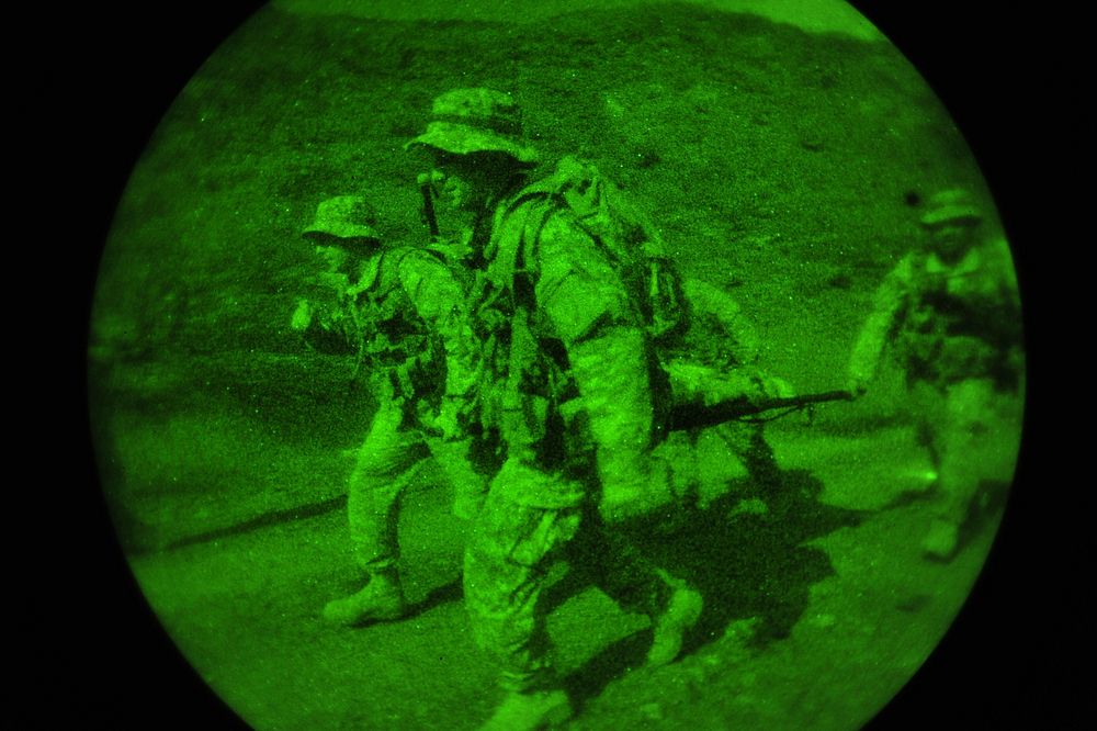 U.S. Soldiers with the 3rd Squadron, 124th Cavalry Regiment, Task Force Raptor perform a four-man litter carry during night…