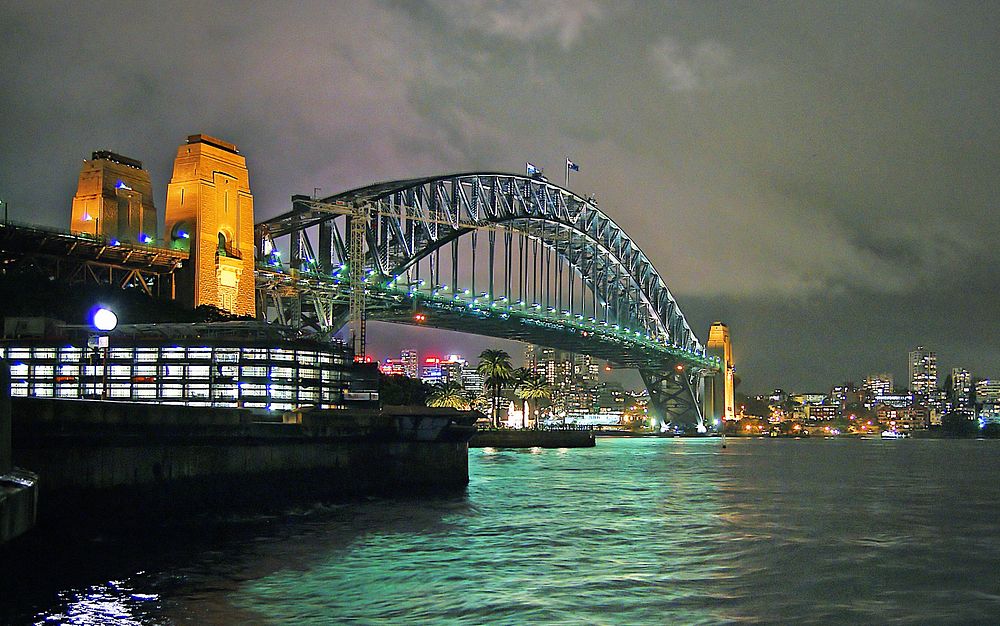 Sydney Harbour Bridge.The Sydney Harbour Bridge is a heritage-listed steel through arch bridge across Sydney Harbour that…
