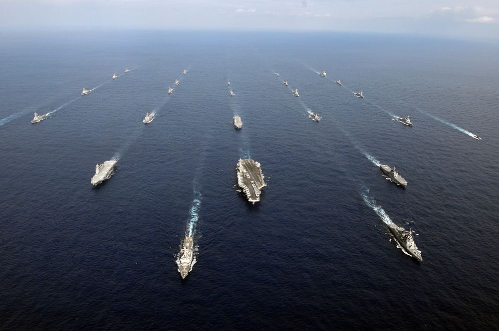 U.S. Navy and Japan Maritime Self-Defense Force ships transit the East China Sea Nov. 16, 2012, after the conclusion of…