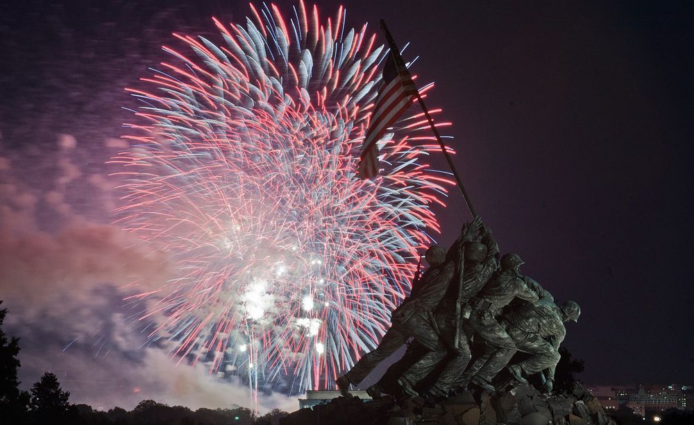 Independence Day celebration fireworks are seen from the Iwo Jima, U.S. Marine Corps Memorial in Arlington, VA on Jul. 4…