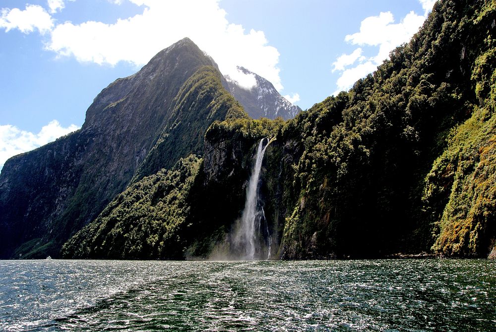 Waterfall from Milford Sound.NZ. Stirling Falls is one of permanent waterfalls on the Milford Sound. This one drops 155m…