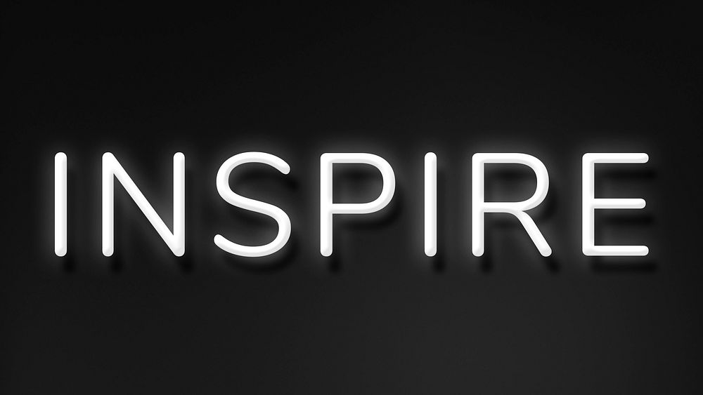 INSPIRE neon word typography on a black background