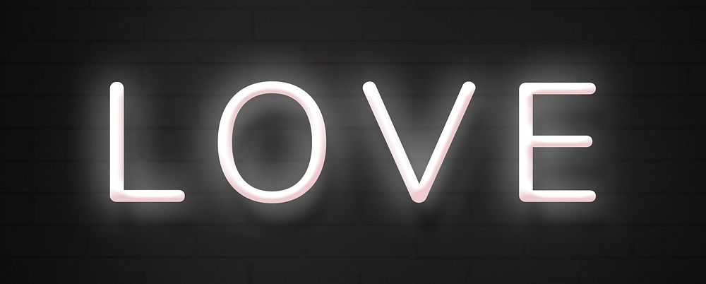 Glowing LOVE neon typography on a black background