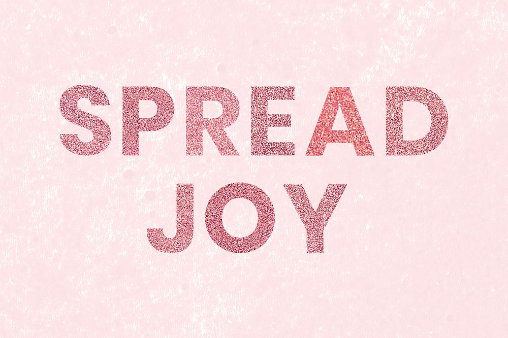 Spread Joy red glitter word typography on concrete background