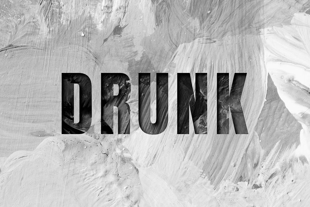 Drunk uppercase letters typography on brush stroke background