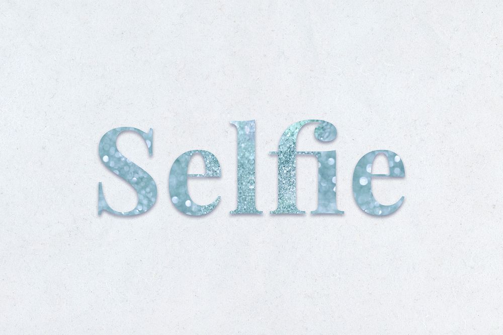 Glittery selfie light blue typography on a blue background