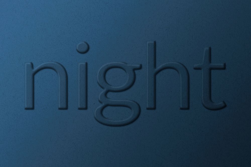 Night embossed word typography on paper texture