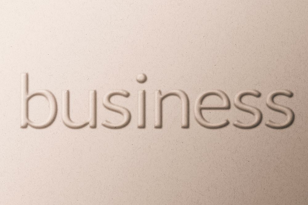 Word business embossed typography on paper texture