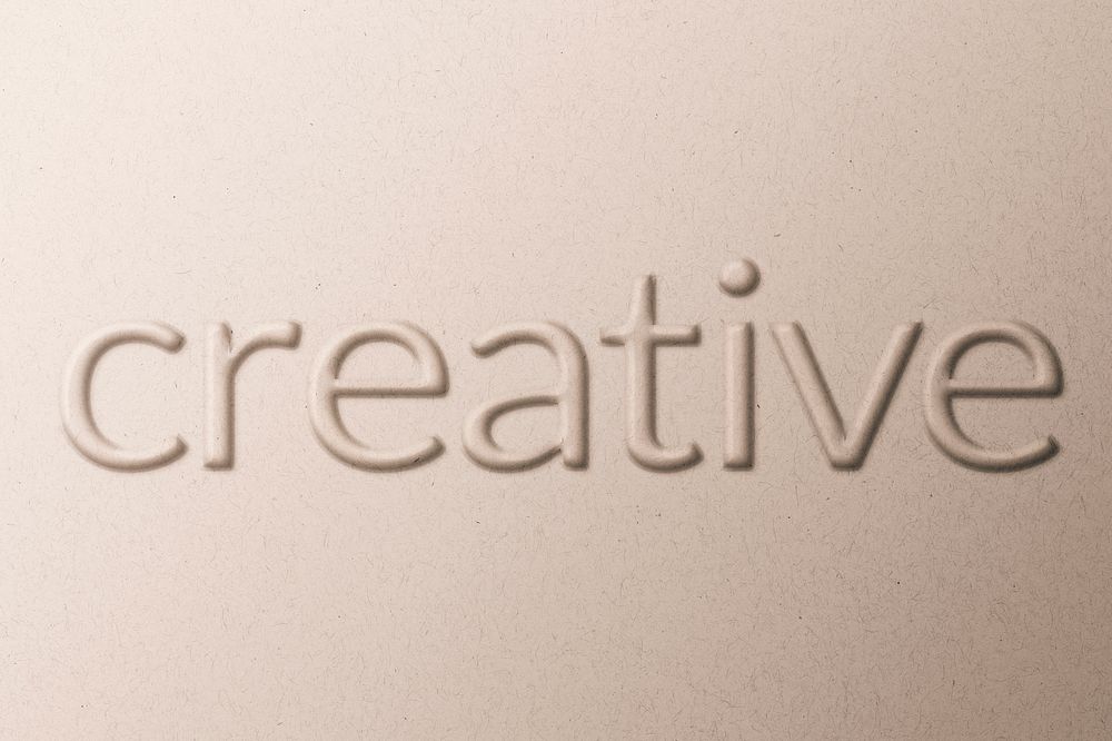 Creative text embossed typography on paper texture