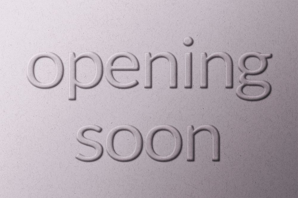 Opening soon message embossed typography on paper texture