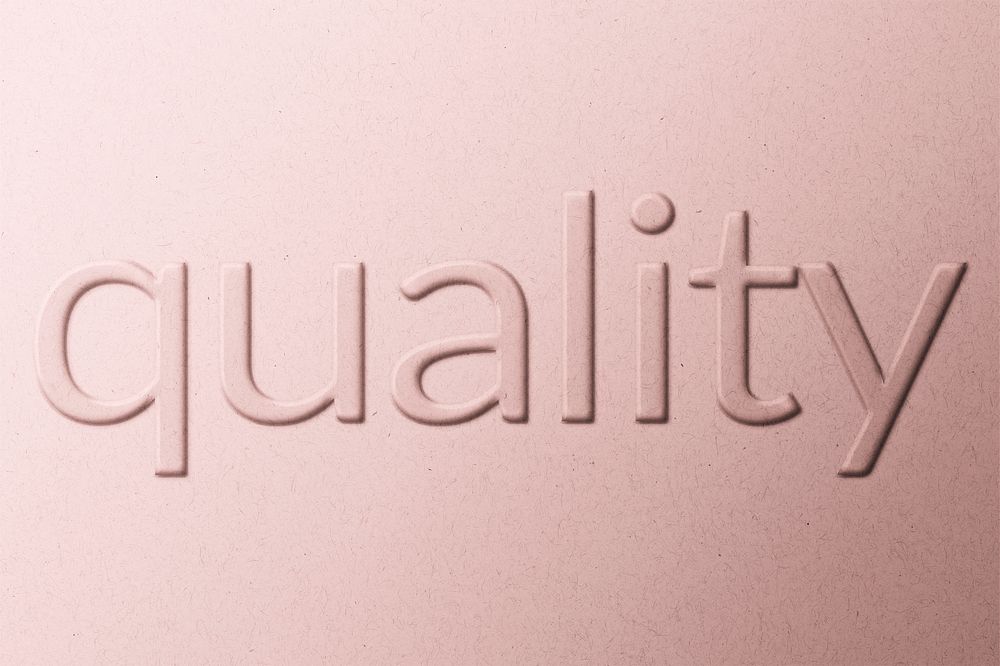 Quality word emboss typography on paper texture