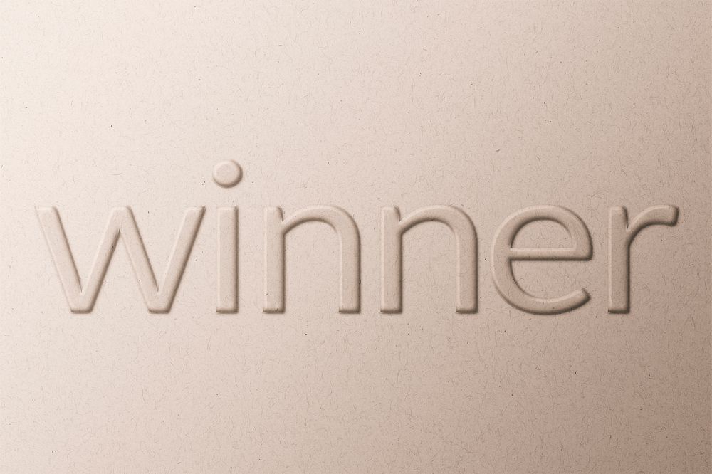 Winner word embossed typography on paper texture