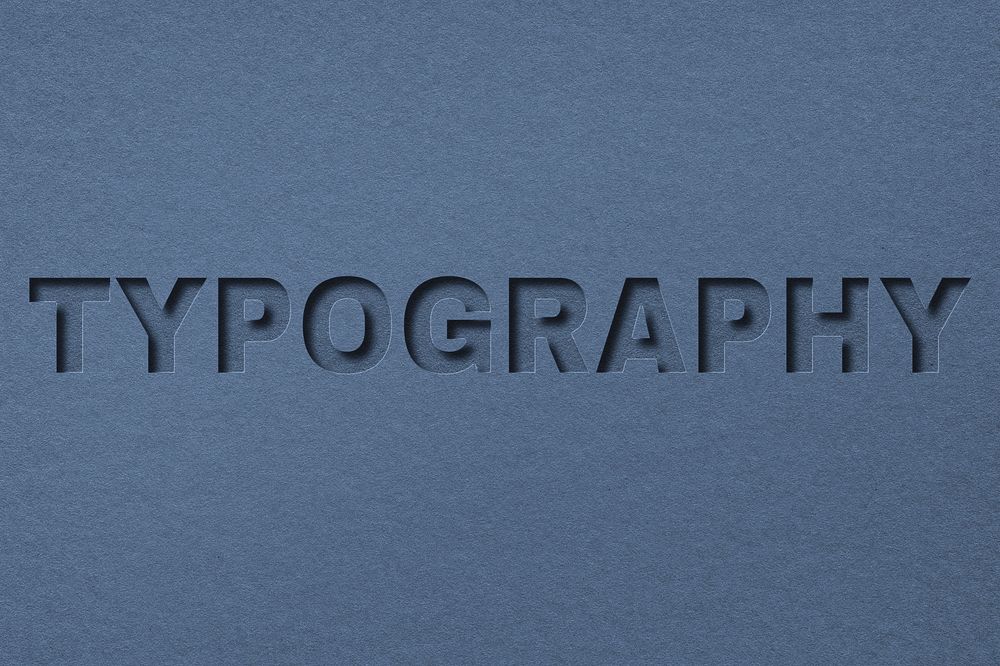 Embossed paper texture typography word font