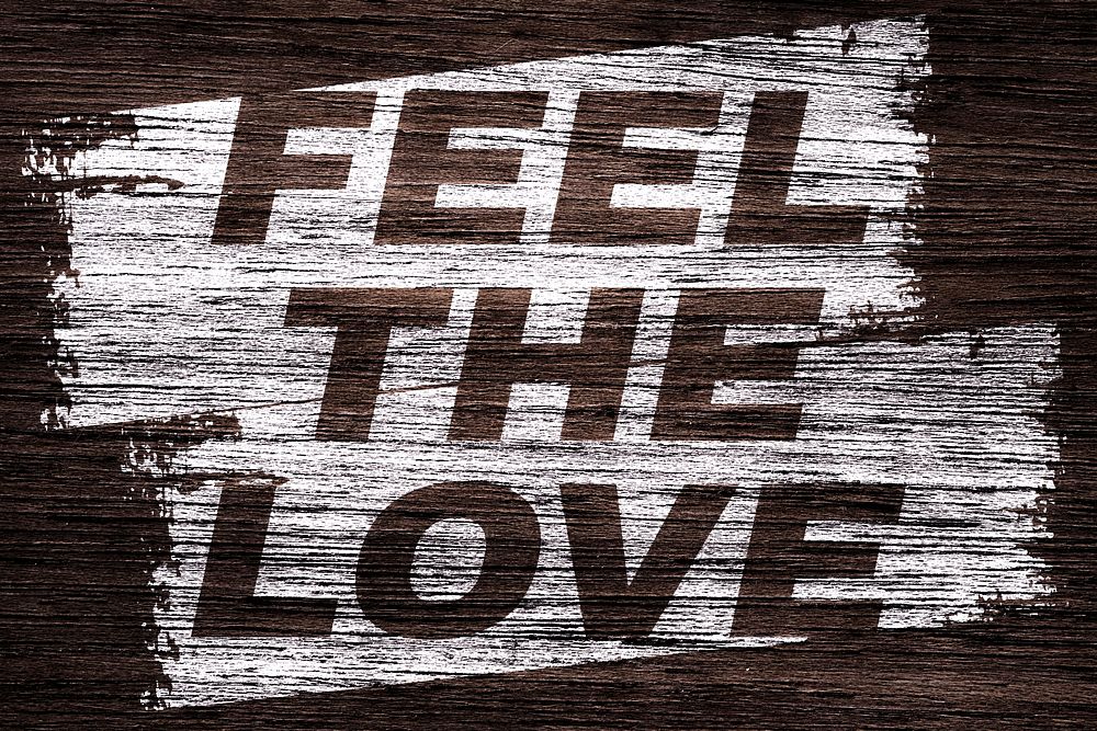 Bold italic feel the love lettering wood texture