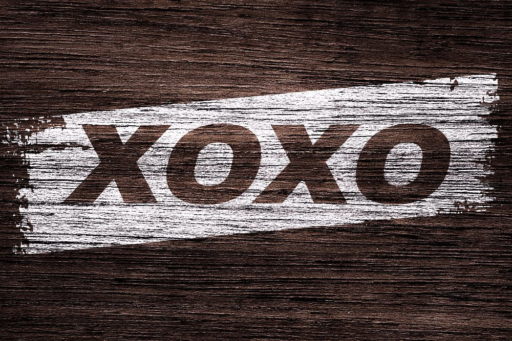 Bold italic XOXO lettering wood texture