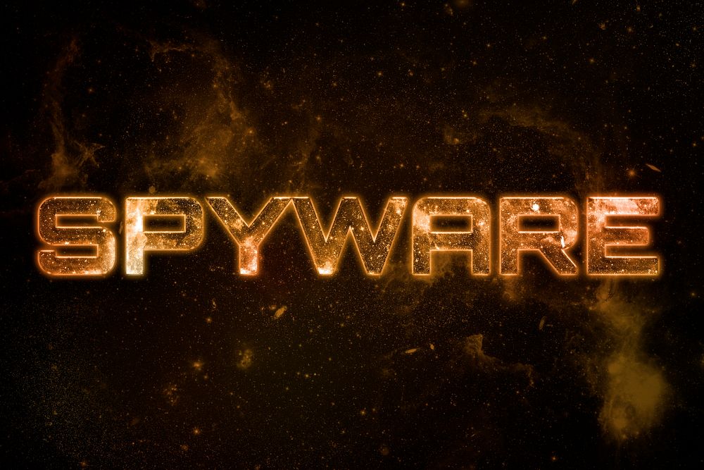 SPYWARE word typography text on galaxy background