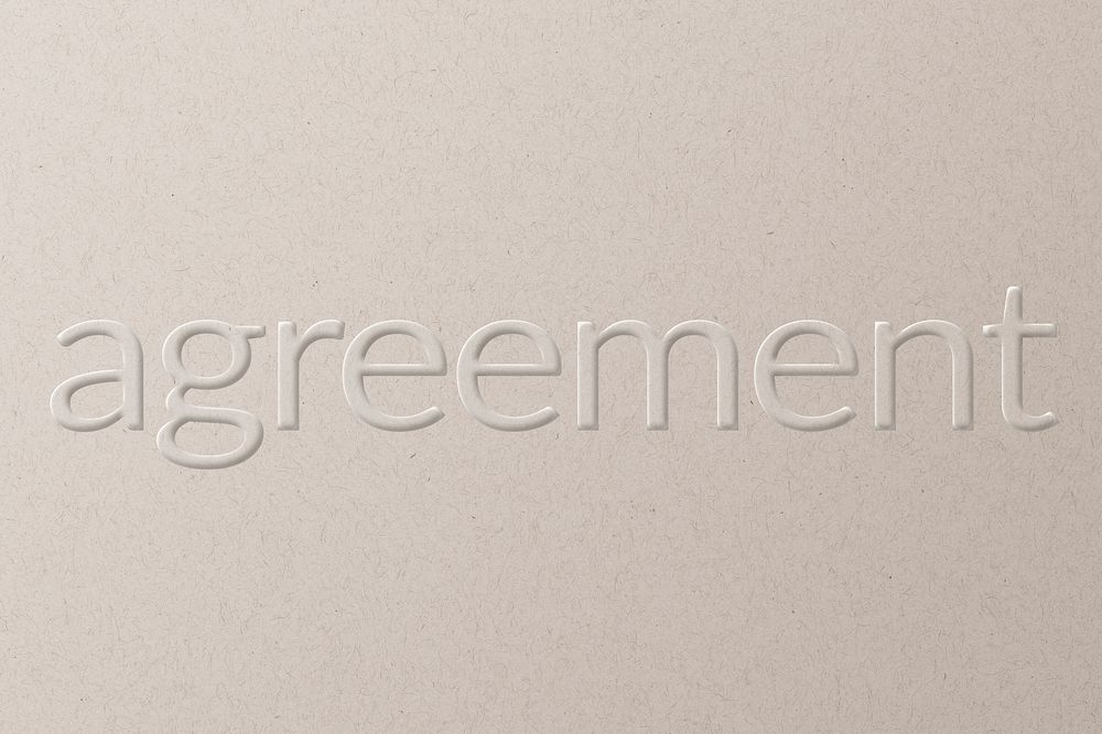 Agreement embossed text white paper background