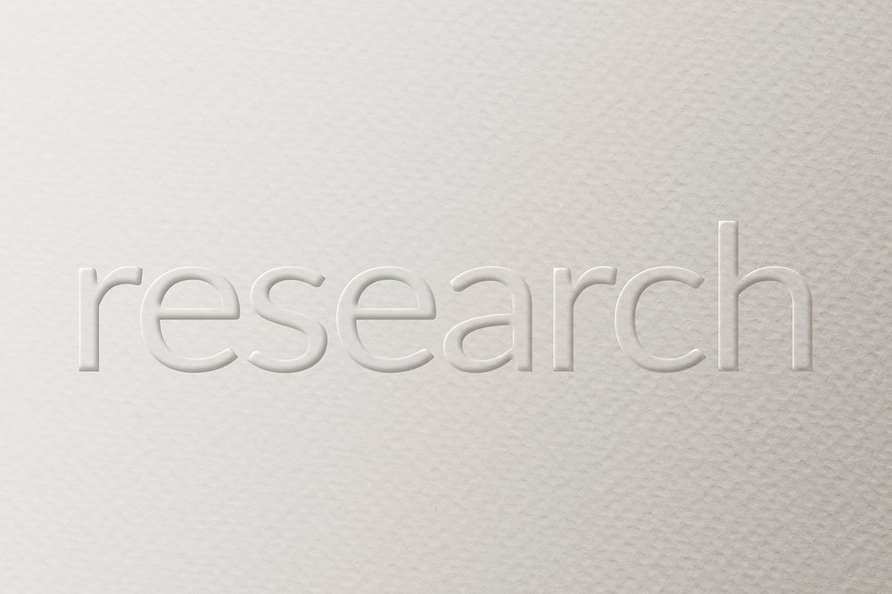 Research embossed text white paper background