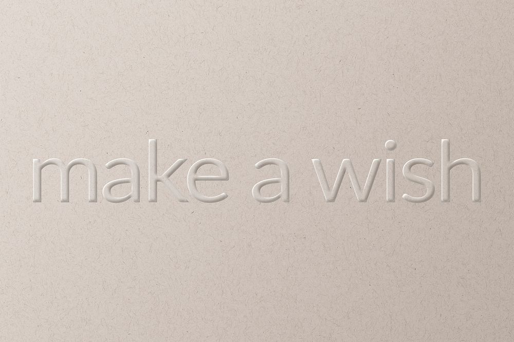 Make a wish embossed text white paper background
