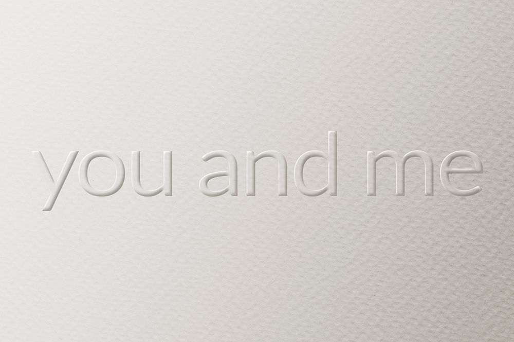 You and me embossed text white paper background