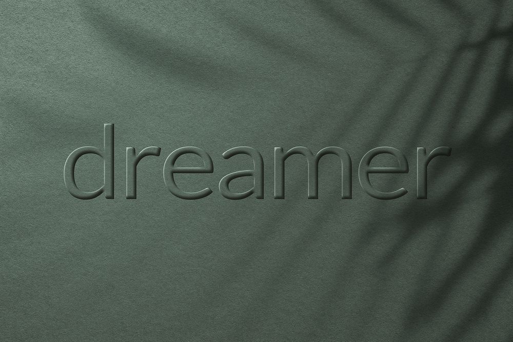 Dreamer word embossed letter typography design