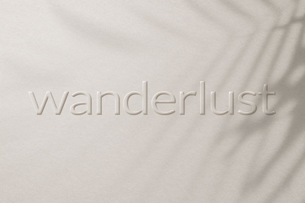 Word wanderlust embossed typography design