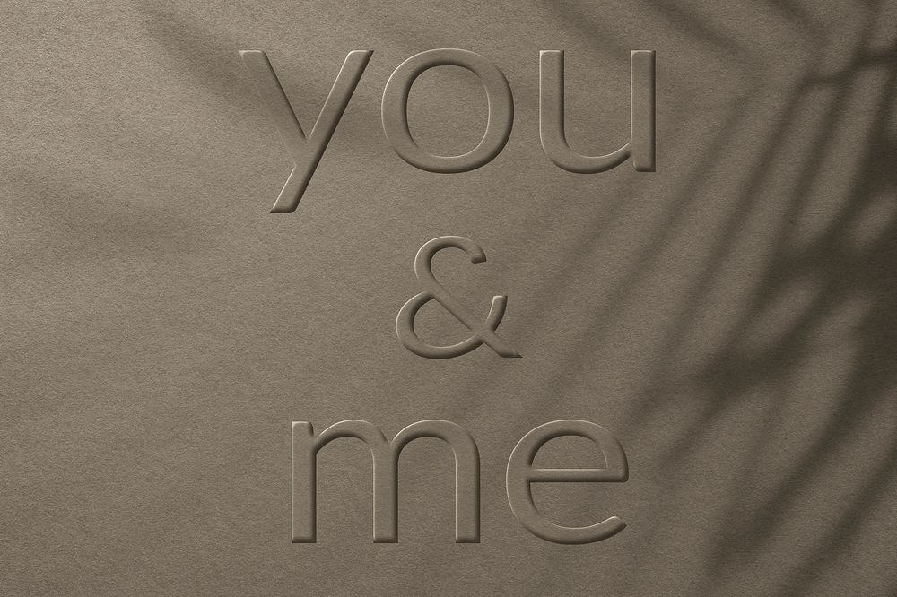 Phrase you & me embossed word typography design