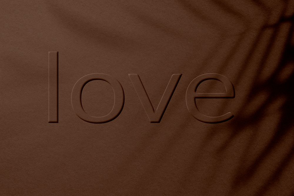 Word love embossed textured typography