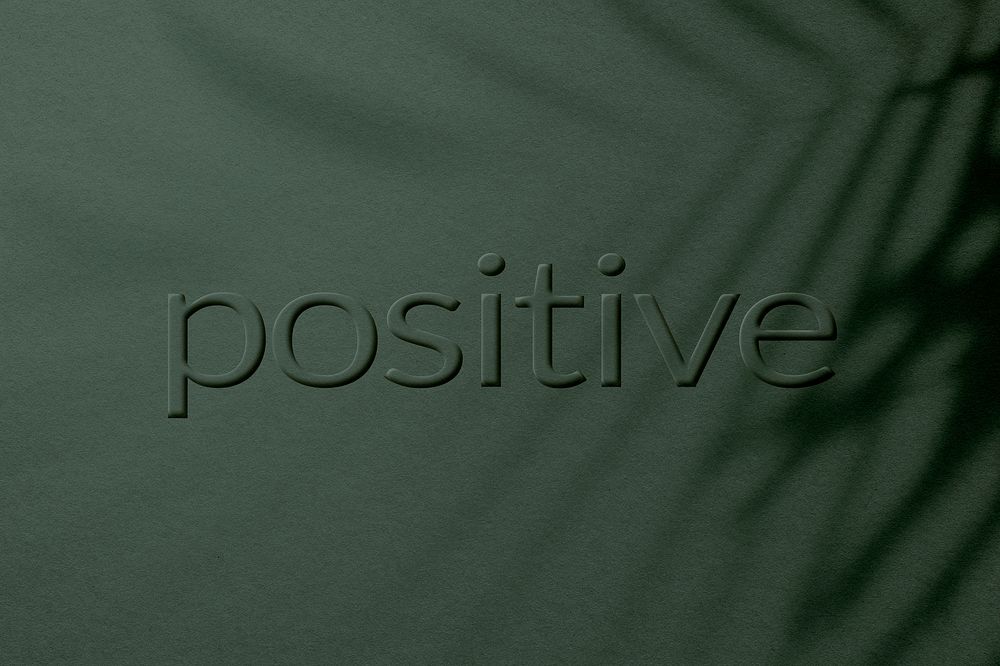 Positive word embossed textured typography