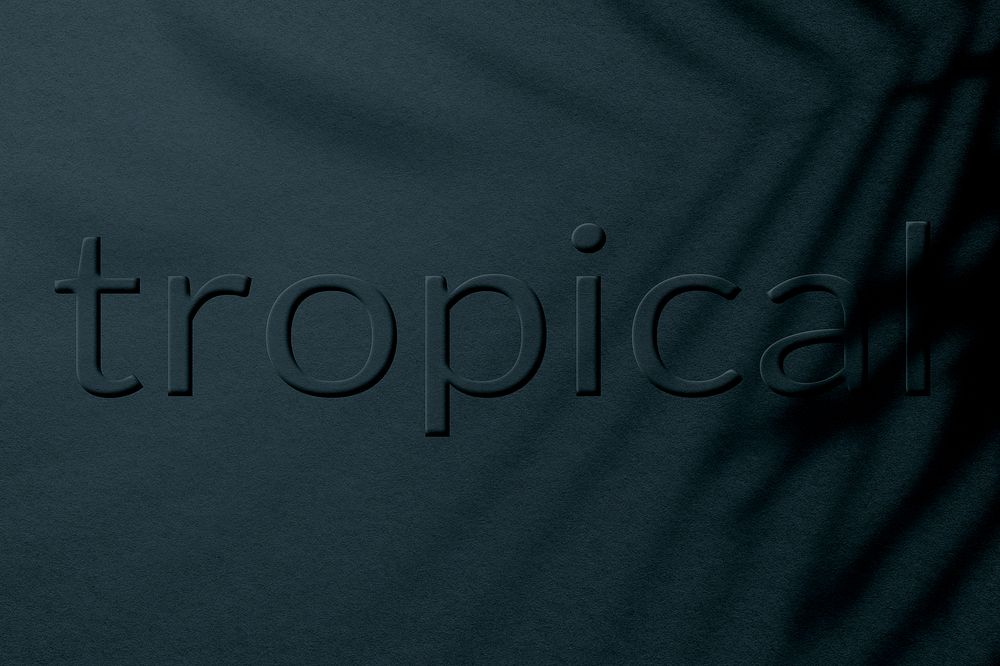 Embossed tropical word plant shadow textured font