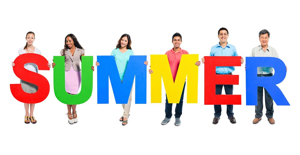 Multi-ethnic group of people holding "SUMMER" letter
