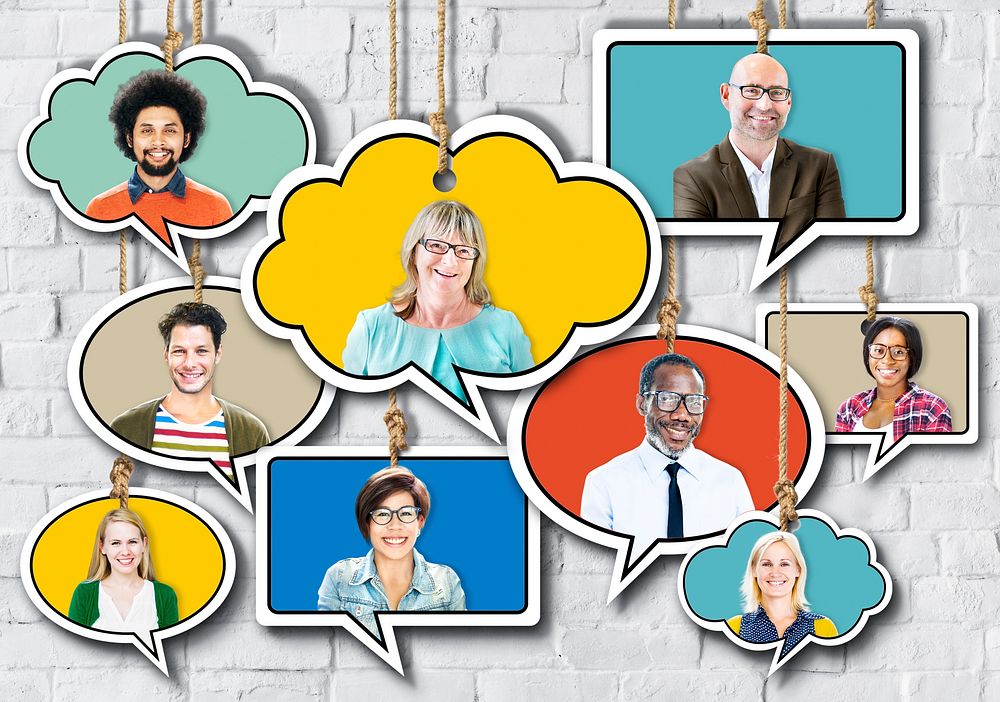 Group of People Smiling in Speech Bubble on Bricks Wall