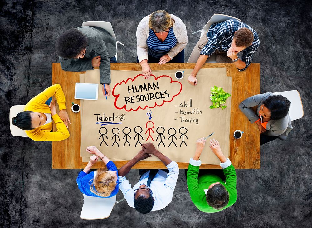 People in a Meeting and Human Resources Concept