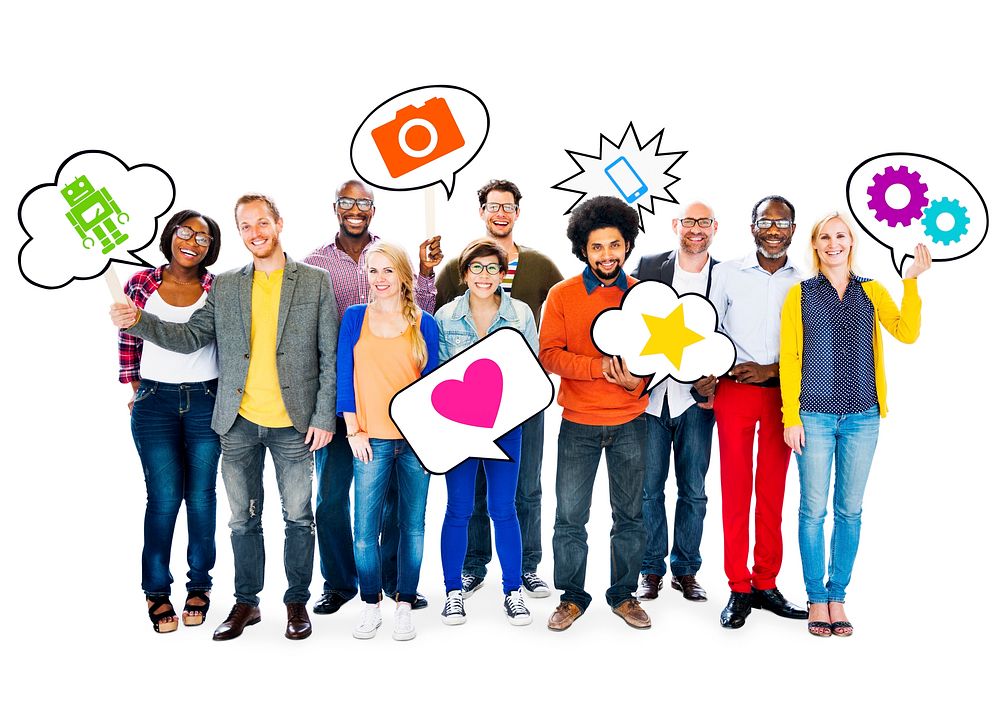 Group Of Happy Multi-Ethnic People Holding Speech Bubbles With Symbols Relating To Social Network