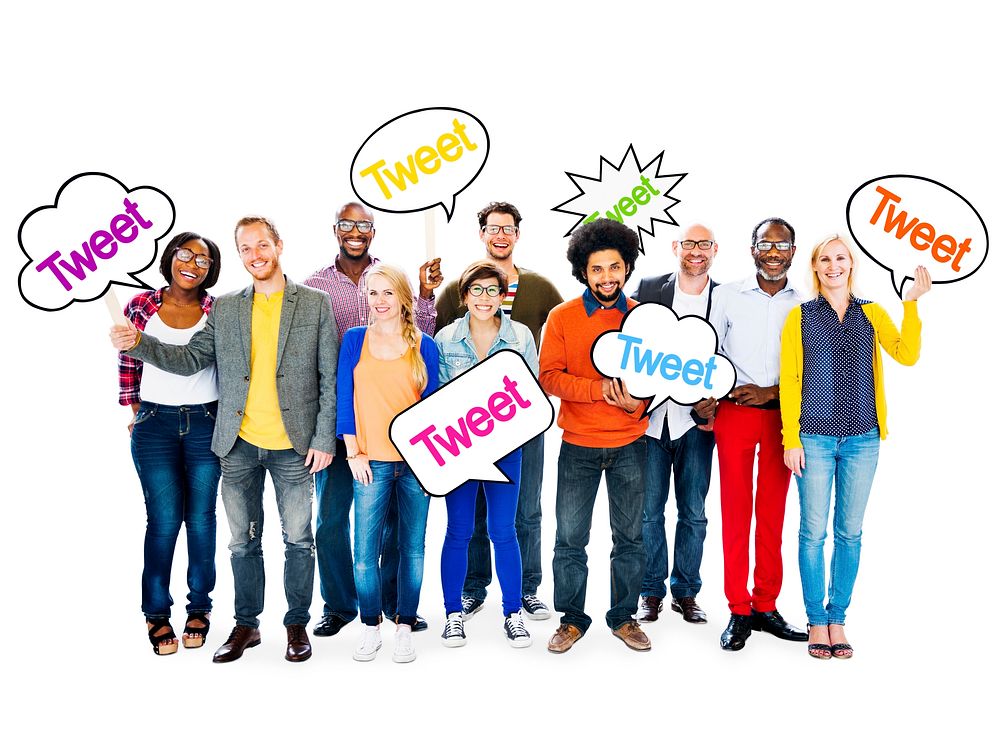 Group Of Happy Multi-Ethnic People Holding Speech Bubbles With The Word Tweet