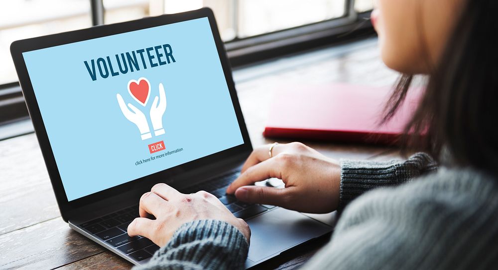 Volunteer Helping Hands Heart Icon Concept.